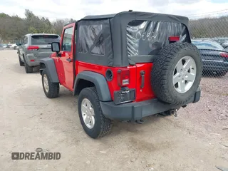 2015 Jeep Wrangler Sport with VIN 1C4GJWAGXFL686842, listed as a IAAI auction lot 42040058 with 154,091 mi miles. Bid and sale history available at carsss.com. Image 3.