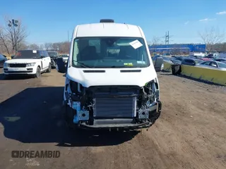 2023 Ford Transit z VIN 1FTYE2C84PKB90935, wystawiony jako IAAI lot #41649489 z przebiegiem 3 272 mil mil oraz . Historia ofert i sprzedaży dostępna na DreamBid. Obrazek 12.