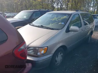 2002 Toyota Sienna LE with VIN 4T3ZF13C42U469088, listed as a IAAI auction lot 42184081 with Not provided miles and . Bid and sale history available at DreamBid. Image 2.