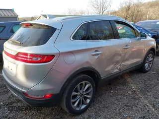 2019 Lincoln MKC Select with VIN 5LMCJ2D97KUL16479, listed as a IAAI auction lot 41789894 with 45,700 mi miles. Bid and sale history available at carsss.com. Image 4.