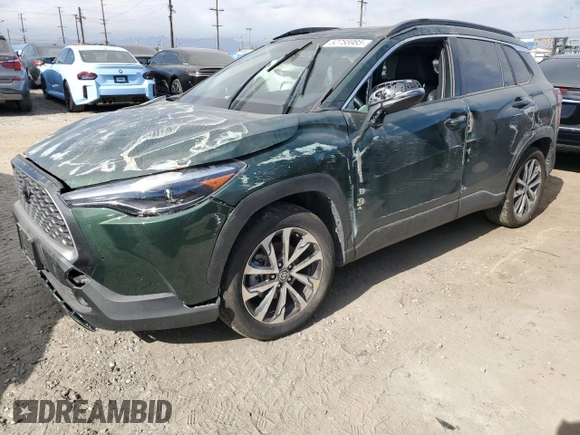 2023 Toyota Corolla Cross XLE z VIN 7MUDAABG2PV047865, wystawiony jako Copart lot #52755985 z przebiegiem 23 787 mil mil oraz Szkoda całkowita • Salvage title. Historia ofert i sprzedaży dostępna na DreamBid. Obrazek 1.