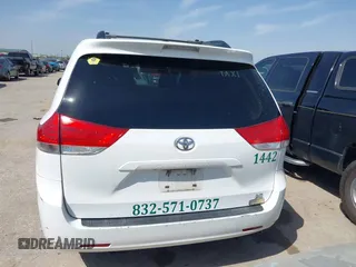 2014 Toyota Sienna LE with VIN 5TDJK3DC5ES081232, listed as a IAAI auction lot 41789629 with 397,033 mi miles and . Bid and sale history available at DreamBid. Image 16.