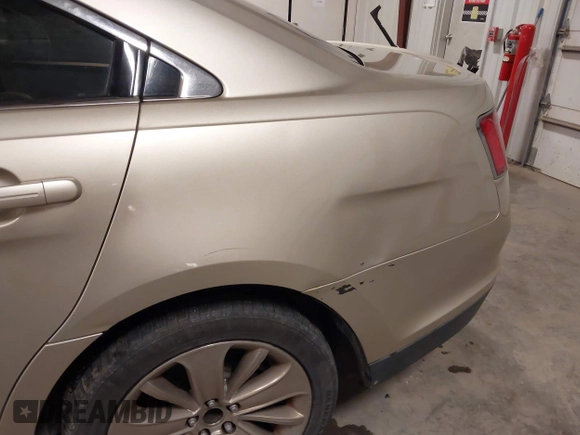 2010 Ford Taurus Limited with VIN 1FAHP2FW9AG133764, listed as a IAAI auction lot 41823527 with 243,477 mi miles and . Bid and sale history available at DreamBid. Image 19.