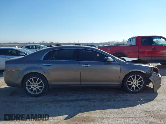 2012 Chevrolet Malibu LTZ with VIN 1G1ZG5E74CF133103, listed as a IAAI auction lot 41640075 with 173,692 mi miles and . Bid and sale history available at DreamBid. Image 13.