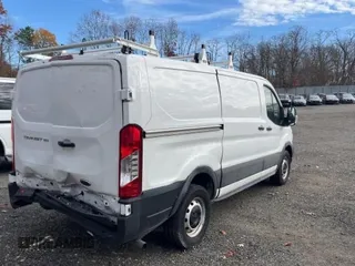 2023 Ford Transit Cargo with VIN 1FTYE1Y8XPKB26711, listed as a Copart auction lot 87334874 with 31,745 mi miles and Salvage Title. Bid and sale history available at DreamBid. Image 4.