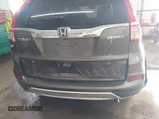 2015 Honda CR-V EX with VIN 2HKRM4H56FH662101, listed as a IAAI auction lot 41623155 with 173,554 mi miles and . Bid and sale history available at DreamBid. Image 6.