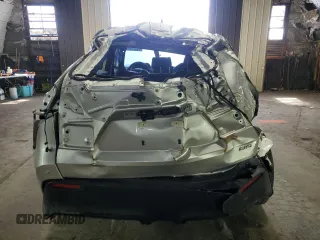 2023 Toyota bZ4X XLE with VIN JTMABACA3PA039663, listed as a Copart auction lot 51595255 with Not Provided miles and Salvage Title. Bid and sale history available at DreamBid. Image 6.