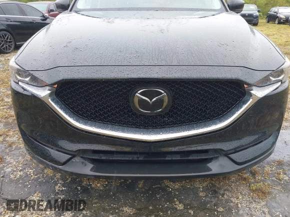 2018 Mazda CX-5 Touring with VIN JM3KFACM0J0315739, listed as a IAAI auction lot 40516262 with 60,727 mi miles. Bid and sale history available at carsss.com. Image 12.
