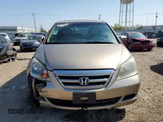 2006 Honda Odyssey EX-L z VIN 5FNRL38726B425098, wystawiony jako Copart lot #56143585 z przebiegiem 153 137 mil mil oraz Szkoda całkowita • Salvage title. Historia ofert i sprzedaży dostępna na DreamBid. Obrazek 5.