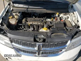 2017 Dodge Journey SXT with VIN 3C4PDCBB8HT675449, listed as a Copart auction lot 88999075 with 105,765 mi miles and Salvage Title. Bid and sale history available at DreamBid. Image 14.