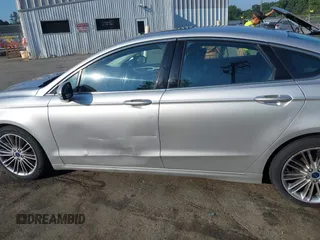 2013 Ford Fusion SE with VIN 3FA6P0H96DR274436, listed as a IAAI auction lot 42602958 with 239,224 mi miles and . Bid and sale history available at DreamBid. Image 14.