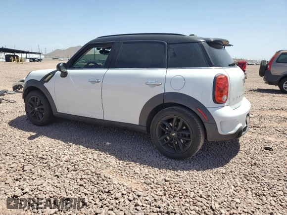 2016 MINI Countryman S with VIN WMWZC3C58GWT09694, listed as a Copart auction lot 57113235 with 126,082 mi miles and Salvage title. Bid and sale history available at DreamBid. Image 2.