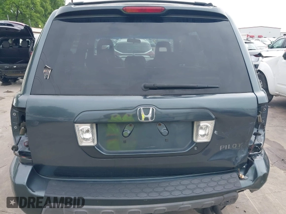 2005 Honda Pilot EX-L with VIN 5FNYF18565B046464, listed as a IAAI auction lot 41879495 with 228,021 mi miles. Bid and sale history available at carsss.com. Image 6.