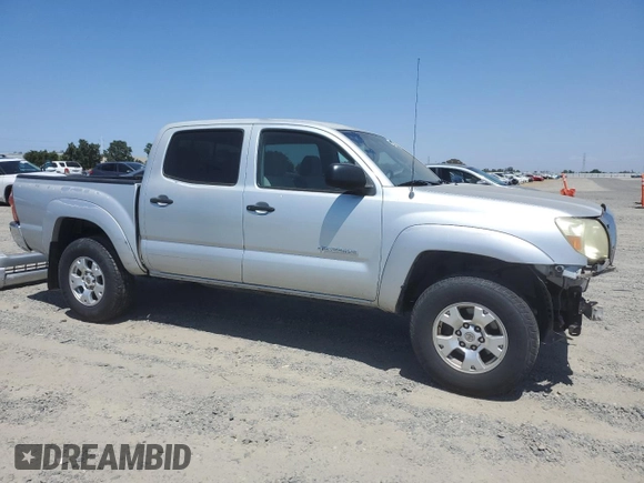 2007 Toyota Tacoma PreRunner with VIN 3TMJU62N77M028907, listed as a Copart auction lot 59622695 with 186,339 mi miles and Salvage title. Bid and sale history available at DreamBid. Image 4.