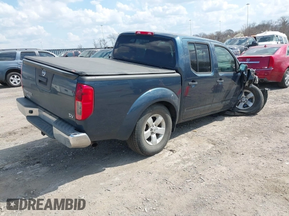 2013 Nissan Frontier SV with VIN 1N6AD0ER3DN737179, listed as a IAAI auction lot 41790962 with 121,014 mi miles and . Bid and sale history available at DreamBid. Image 4.