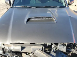 2010 Toyota Tacoma PreRunner with VIN 3TMKU4HN3AM025218, listed as a Copart auction lot 87600035 with 92,605 mi miles and Salvage title. Bid and sale history available at DreamBid. Image 11.