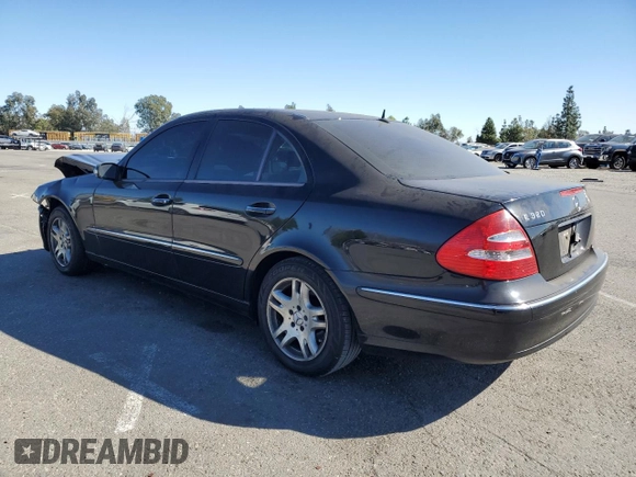 2003 Mercedes-Benz E-Class 3.2L with VIN WDBUF65J23A108105, listed as a Copart auction lot 79939884 with 238,172 mi miles and Salvage Title. Bid and sale history available at carsss.com. Image 2.