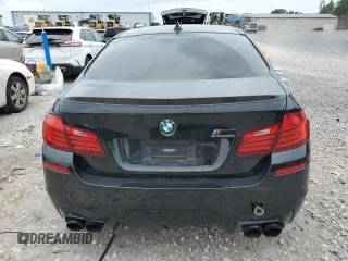 2016 BMW M5 z VIN WBSFV9C56GD595441, wystawiony jako Copart lot #59880955 z przebiegiem 109 018 mil mil oraz Szkoda całkowita • Salvage title. Historia ofert i sprzedaży dostępna na DreamBid. Obrazek 6.