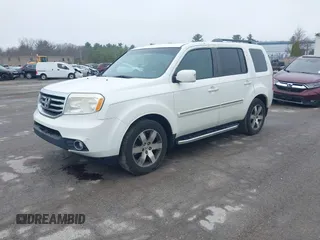 2013 Honda Pilot Touring with VIN 5FNYF4H95DB011661, listed as a IAAI auction lot 42101104 with 298,004 mi miles and . Bid and sale history available at carsss.com. Image 2.