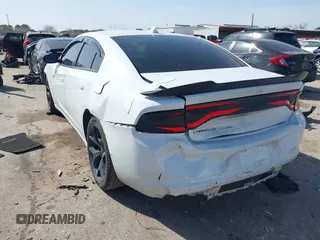 2015 Dodge Charger SXT with VIN 2C3CDXHG8FH725446, listed as a IAAI auction lot 41742400 with 84,579 mi miles and . Bid and sale history available at DreamBid. Image 3.