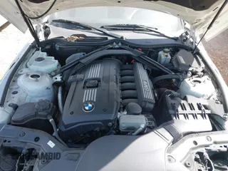 2011 BMW Z4 sDrive30i with VIN WBALM5C55BE380154, listed as a IAAI auction lot 41815724 with 118,062 mi miles. Bid and sale history available at carsss.com. Image 10.