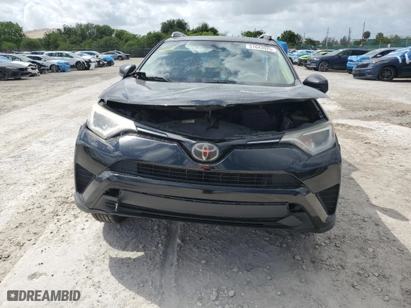 2018 Toyota RAV4 LE with VIN 2T3ZFREV9JW480695, listed as a Copart auction lot 51643925 with 130,313 mi miles and Salvage Title. Bid and sale history available at carsss.com. Image 5.