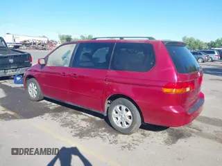 2004 Honda Odyssey EX with VIN 5FNRL18644B122591, listed as a IAAI auction lot 42207036 with 166,179 mi miles and . Bid and sale history available at DreamBid. Image 3.