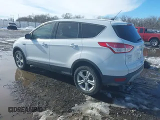 2013 Ford Escape SE with VIN 1FMCU9GX2DUD19077, listed as a IAAI auction lot 41578028 with 124,890 mi miles. Bid and sale history available at carsss.com. Image 3.