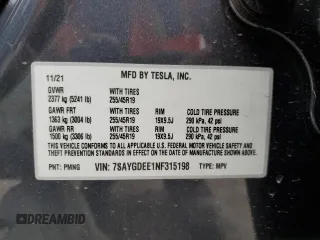 2022 Tesla Model Y Long Range with VIN 7SAYGDEE1NF315198, listed as a Copart auction lot 50399005 with 33,357 mi miles and Salvage Title. Bid and sale history available at DreamBid. Image 14.