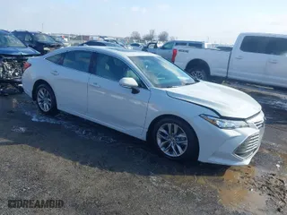 2022 Toyota Avalon XLE with VIN 4T1AZ1FB1NU079120, listed as a IAAI auction lot 41568799 with 63,419 mi miles. Bid and sale history available at carsss.com. Image 1.