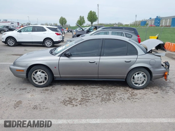 1997 Saturn SL with VIN 1G8ZK527XVZ257477, listed as a IAAI auction lot 42029648 with 114,371 mi miles and . Bid and sale history available at DreamBid. Image 14.