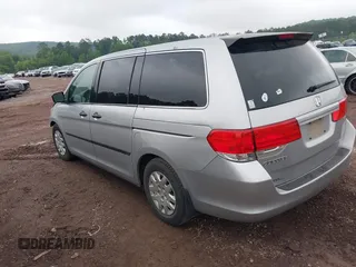 2010 Honda Odyssey LX with VIN 5FNRL3H21AB100181, listed as a IAAI auction lot 42258010 with 246,463 mi miles and . Bid and sale history available at DreamBid. Image 3.