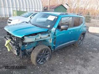 2021 Jeep Renegade Latitude with VIN ZACNJDBB7MPM53764, listed as a IAAI auction lot 41364522 with 58,457 mi miles. Bid and sale history available at carsss.com. Image 2.