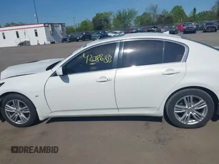 2015 Infiniti Q40 with VIN JN1CV6AP5FM502634, listed as a IAAI auction lot 42086833 with 82,909 mi miles and . Bid and sale history available at DreamBid. Image 14.