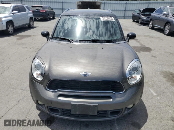 2011 MINI Countryman S with VIN WMWZC5C5XBWL55516, listed as a Copart auction lot 63239235 with 137,545 mi miles and Salvage title. Bid and sale history available at DreamBid. Image 5.