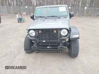 2023 Jeep Wrangler Sport S with VIN 1C4HJXDN0PW638934, listed as a IAAI auction lot 41719467 with 16,686 mi miles and . Bid and sale history available at DreamBid. Image 6.