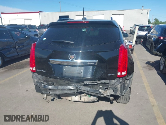 2015 Cadillac SRX Premium Collection with VIN 3GYFNGE3XFS554620, listed as a IAAI auction lot 42308670 with 95,063 mi miles and . Bid and sale history available at DreamBid. Image 16.