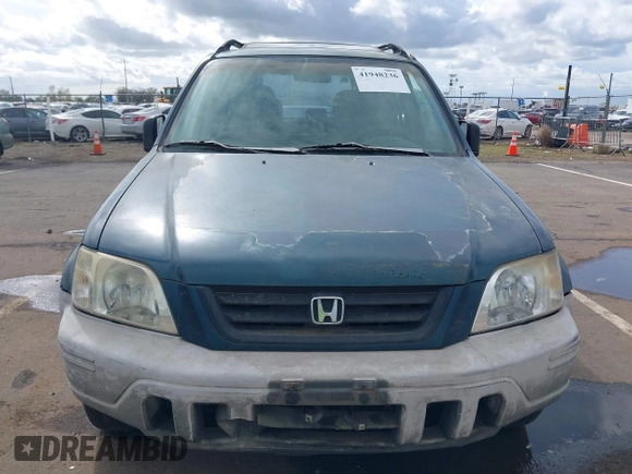 1997 Honda CR-V with VIN JHLRD1850VC057518, listed as a IAAI auction lot 41948236 with 251,707 mi miles. Bid and sale history available at carsss.com. Image 6.