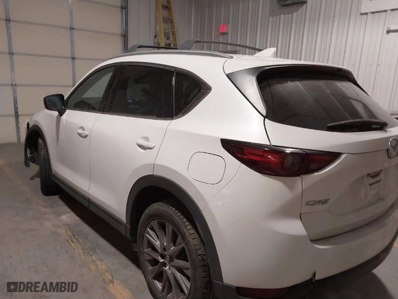 2019 Mazda CX-5 Grand Touring with VIN JM3KFADM7K1563576, listed as a IAAI auction lot 41617026 with NaN miles. Bid and sale history available at carsss.com. Image 3.