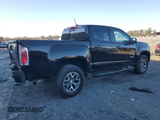 2021 GMC Canyon 4WD AT4 w/Cloth with VIN 1GTG6FEN5M1100096, listed as a Copart auction lot 77535584 with 25,152 mi miles and Salvage Title. Bid and sale history available at carsss.com. Image 3.