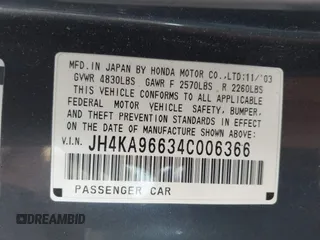 2004 Acura RL w/Navigation System with VIN JH4KA96634C006366, listed as a IAAI auction lot 42054689 with 350,809 mi miles. Bid and sale history available at carsss.com. Image 9.