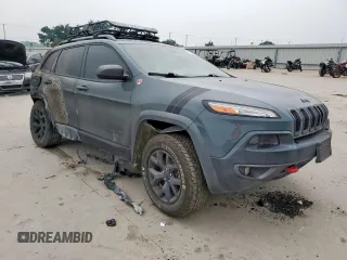 2015 Jeep Cherokee Trailhawk with VIN 1C4PJMBS9FW576340, listed as a Copart auction lot 57108045 with Not provided miles and Non repairable. Bid and sale history available at DreamBid. Image 4.