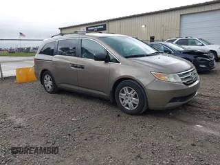 2012 Honda Odyssey LX z VIN 5FNRL5H23CB021450, wystawiony jako IAAI lot #42397508 z przebiegiem 215 335 mil mil oraz . Historia ofert i sprzedaży dostępna na DreamBid. Obrazek 1.
