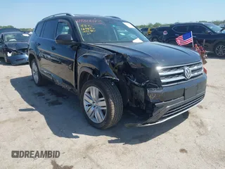 2019 Volkswagen Atlas SE z VIN 1V2WR2CA4KC595211, wystawiony jako IAAI lot #41986643 z przebiegiem 96 299 mil mil oraz . Historia ofert i sprzedaży dostępna na DreamBid. Obrazek 6.