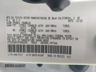2023 Toyota Tacoma SR with VIN 3TMCZ5AN1PM556299, listed as a IAAI auction lot 42344160 with 42,338 mi miles and . Bid and sale history available at DreamBid. Image 9.