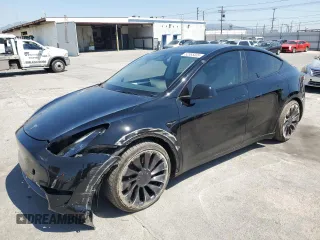 2023 Tesla Model Y Performance z VIN 7SAYGDEF6PF846425, wystawiony jako Copart lot #52365335 z przebiegiem 26 839 mil mil oraz Szkoda całkowita • Salvage title. Historia ofert i sprzedaży dostępna na DreamBid. Obrazek 1.