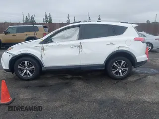 2018 Toyota RAV4 XLE with VIN 2T3WFREV0JW452030, listed as a IAAI auction lot 41915411 with 1 mi miles. Bid and sale history available at carsss.com. Image 15.