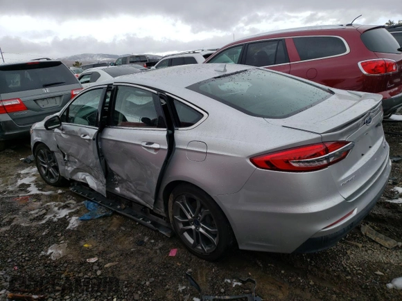 2019 Ford Fusion Hybrid Titanium with VIN 3FA6P0RU4KR182029, listed as a Copart auction lot 45426203 with 71,021 mi miles. Bid and sale history available at carsss.com. Image 2.