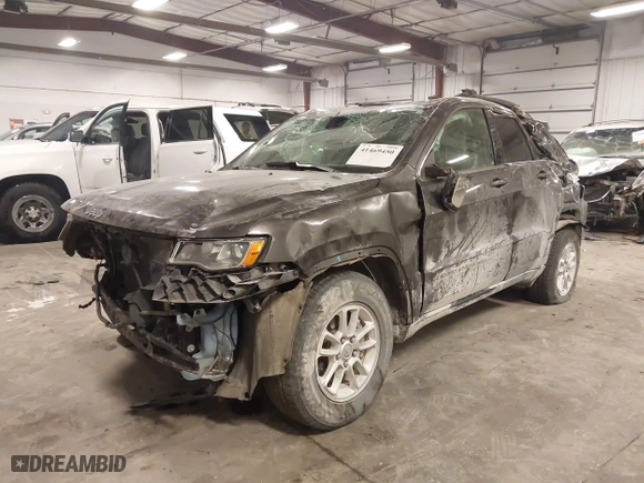 2018 Jeep Grand Cherokee Laredo E with VIN 1C4RJFAG4JC313054, listed as a IAAI auction lot 41469450 with 142,929 mi miles. Bid and sale history available at carsss.com. Image 6.