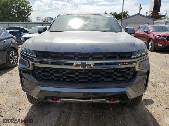 2022 Chevrolet Suburban Z71 with VIN 1GNSKDKD1NR202155, listed as a Copart auction lot 60653304 with 67,495 mi miles and Salvage Title. Bid and sale history available at carsss.com. Image 5.